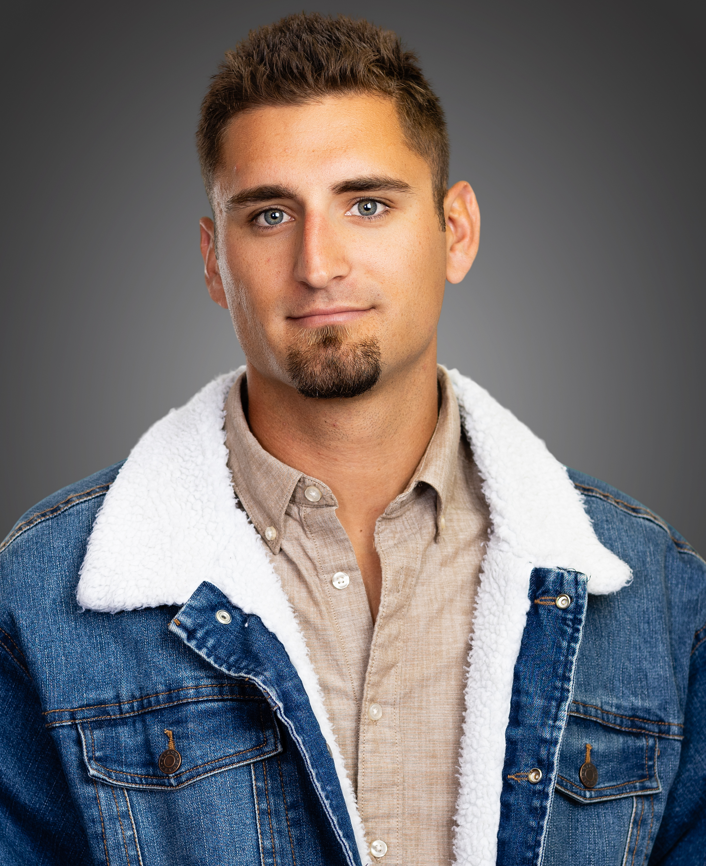 Commercial acting headshot St. Louis — warm natural expression, studio lighting